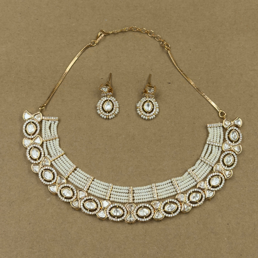 Aanya Ivory Kundan Necklace Set with Earrings for Festive Wear