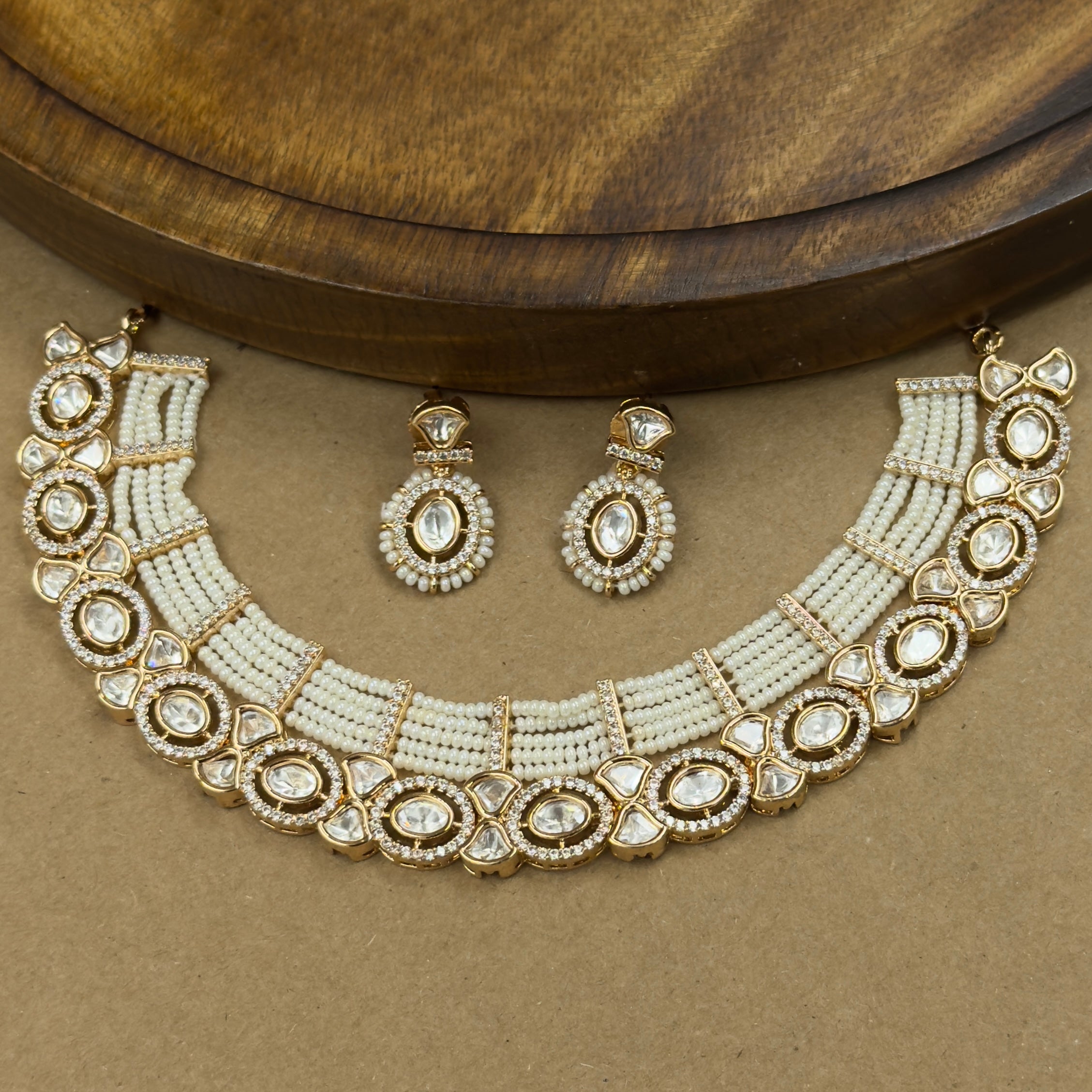 Aanya Ivory Kundan Necklace Set with Earrings for Festive Wear