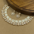 Aanya Ivory Kundan Necklace Set with Earrings for Festive Wear