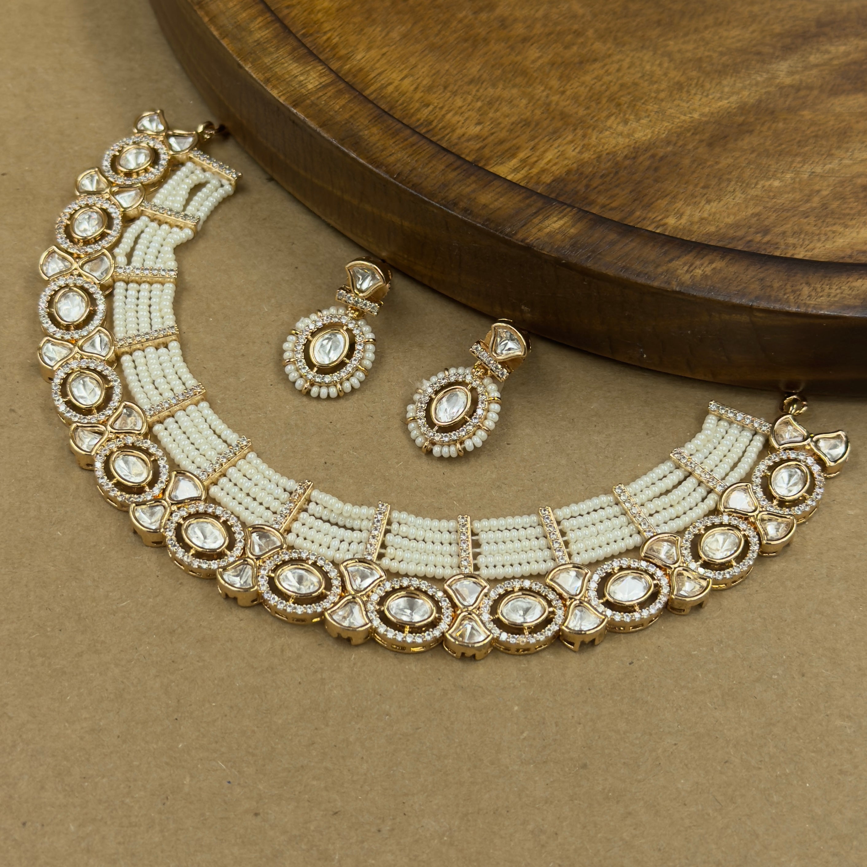 Aanya Ivory Kundan Necklace Set with Earrings for Festive Wear
