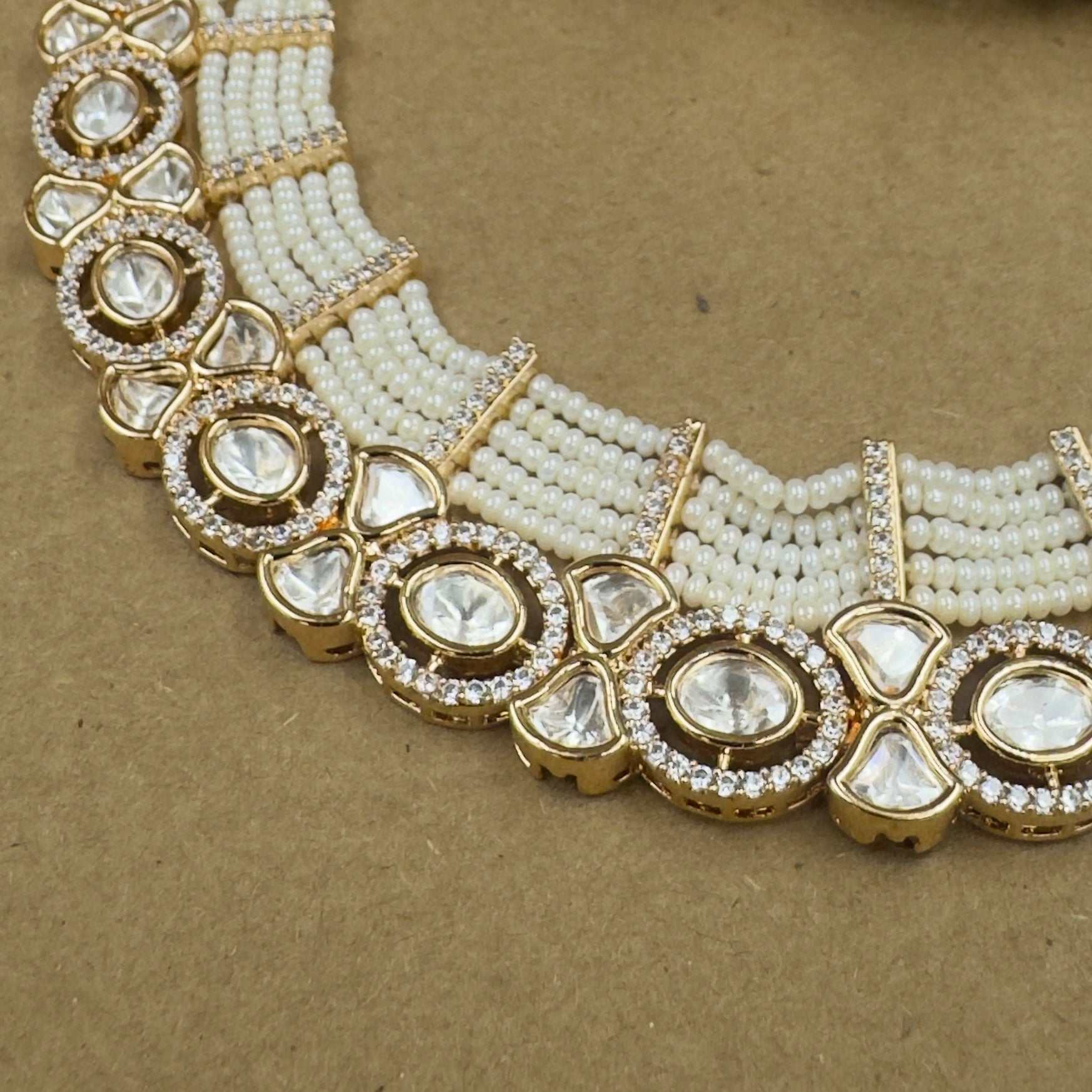 Aanya Ivory Kundan Necklace Set with Earrings for Festive Wear