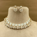 Aanya Ivory Kundan Necklace Set with Earrings for Festive Wear