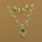 Vainavi green antique necklace set with earrings by The Girivara