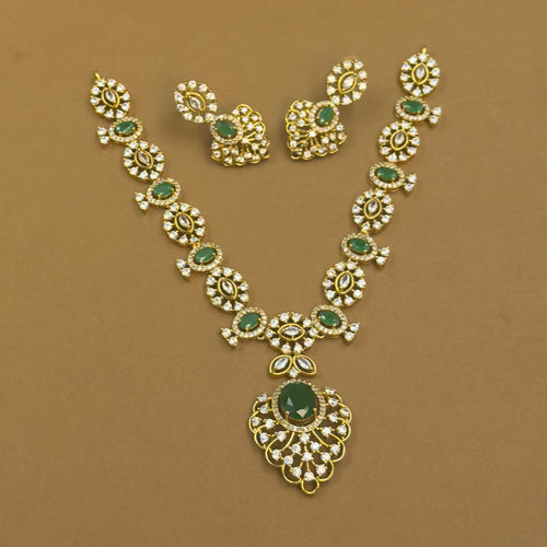 Vainavi green antique necklace set with earrings by The Girivara