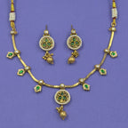 Mrinalini emerald green antique necklace set with matching earrings