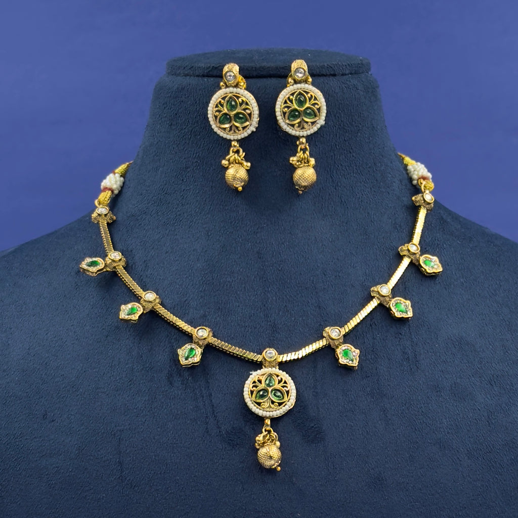 Mrinalini emerald green antique necklace set with matching earrings