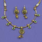 Jyotsna emerald green antique necklace set with matching earrings