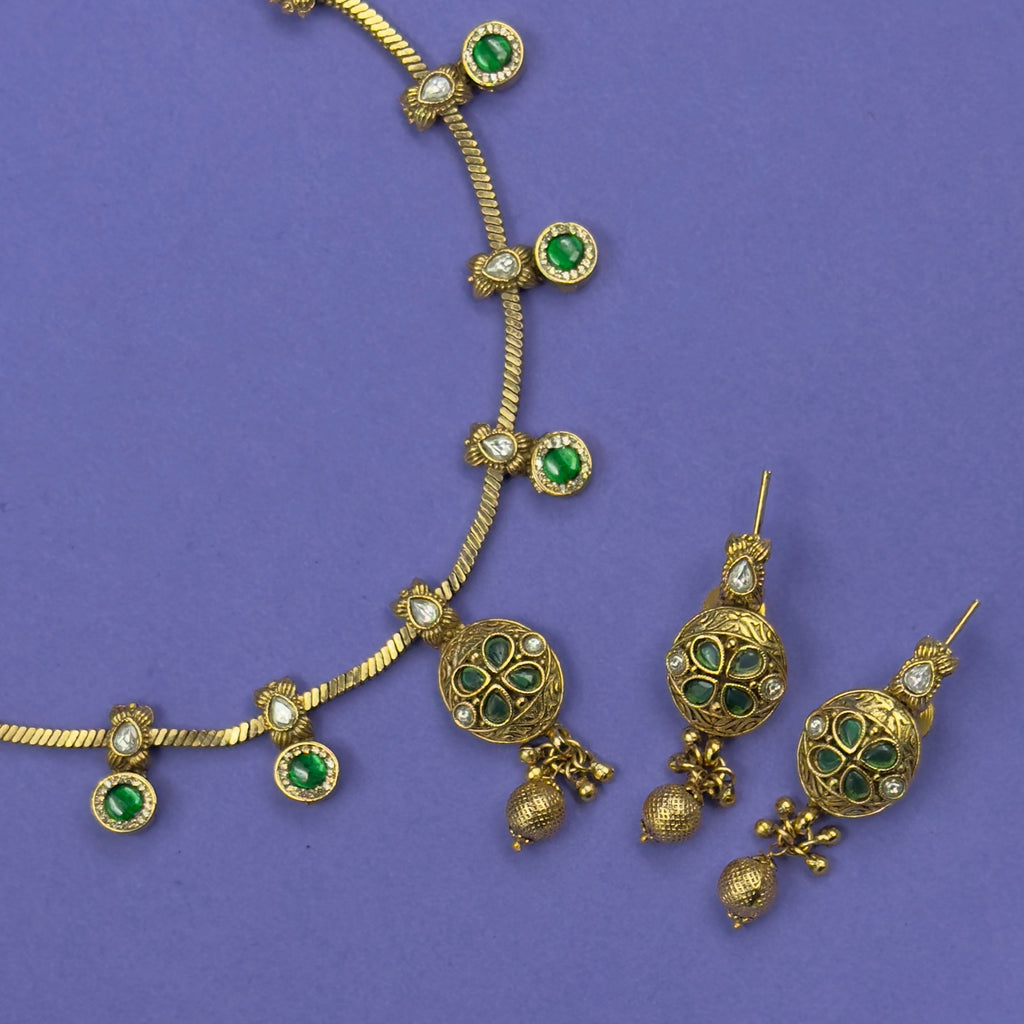 Jyotsna emerald green antique necklace set with matching earrings