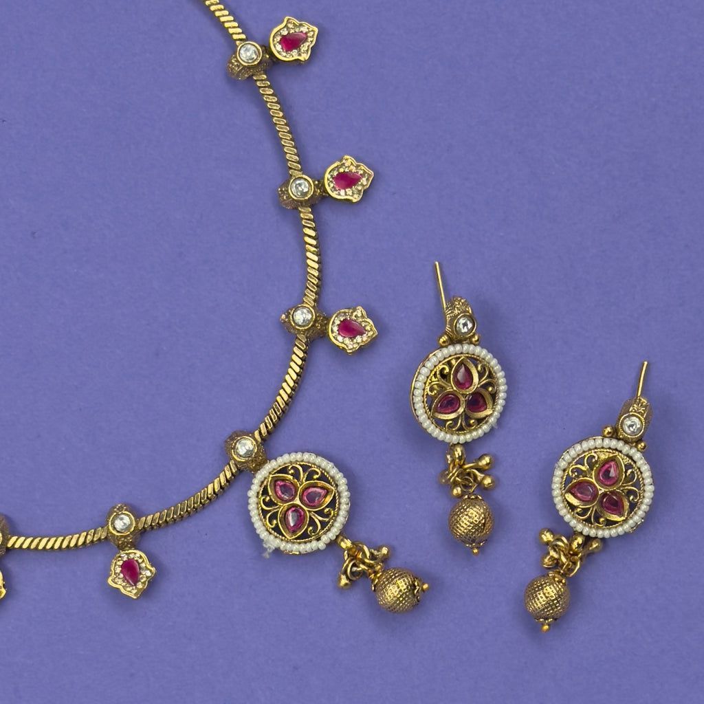 Niharika ruby red antique necklace set with matching earrings