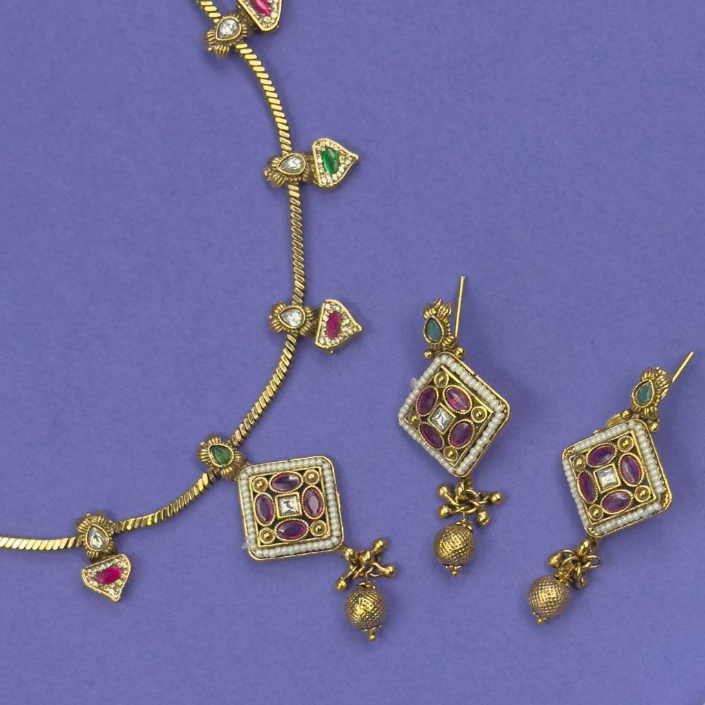Ellora green and ruby multicolor antique necklace set with matching earrings