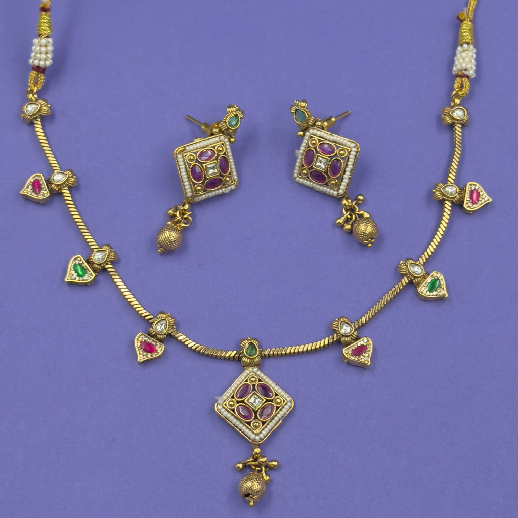 Ellora green and ruby multicolor antique necklace set with matching earrings
