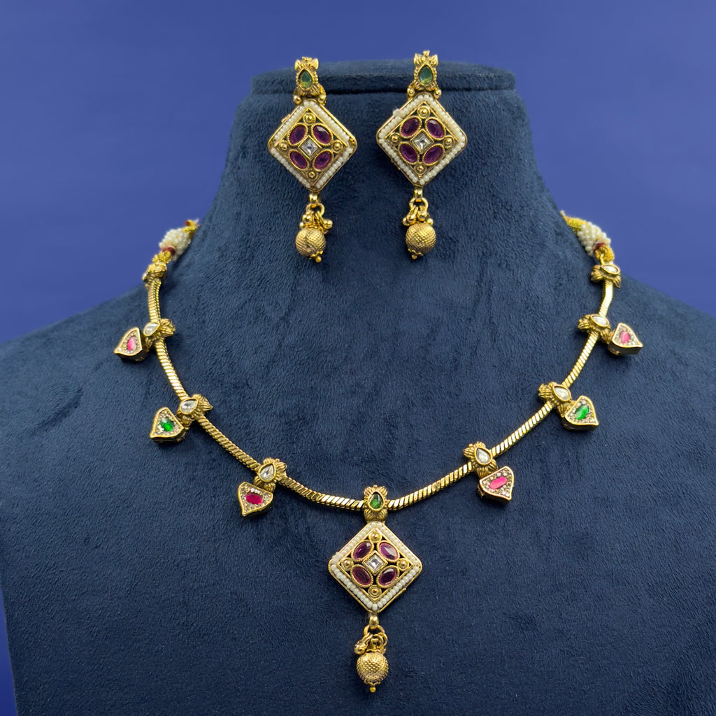 Ellora green and ruby multicolor antique necklace set with matching earrings